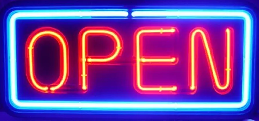 Neon lights glowing red spell OPEN, surrounded by a glowing blue rectangle.