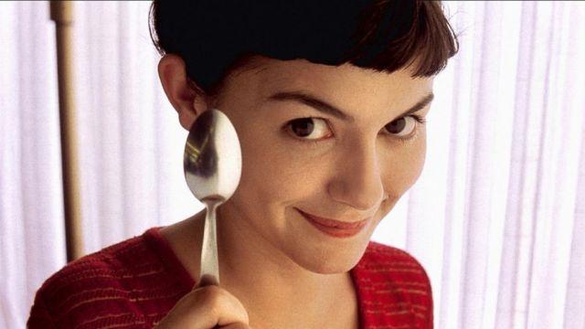 French actress Audrey Tautou brandishes a spoon in publicity photo for the movie Amélie.