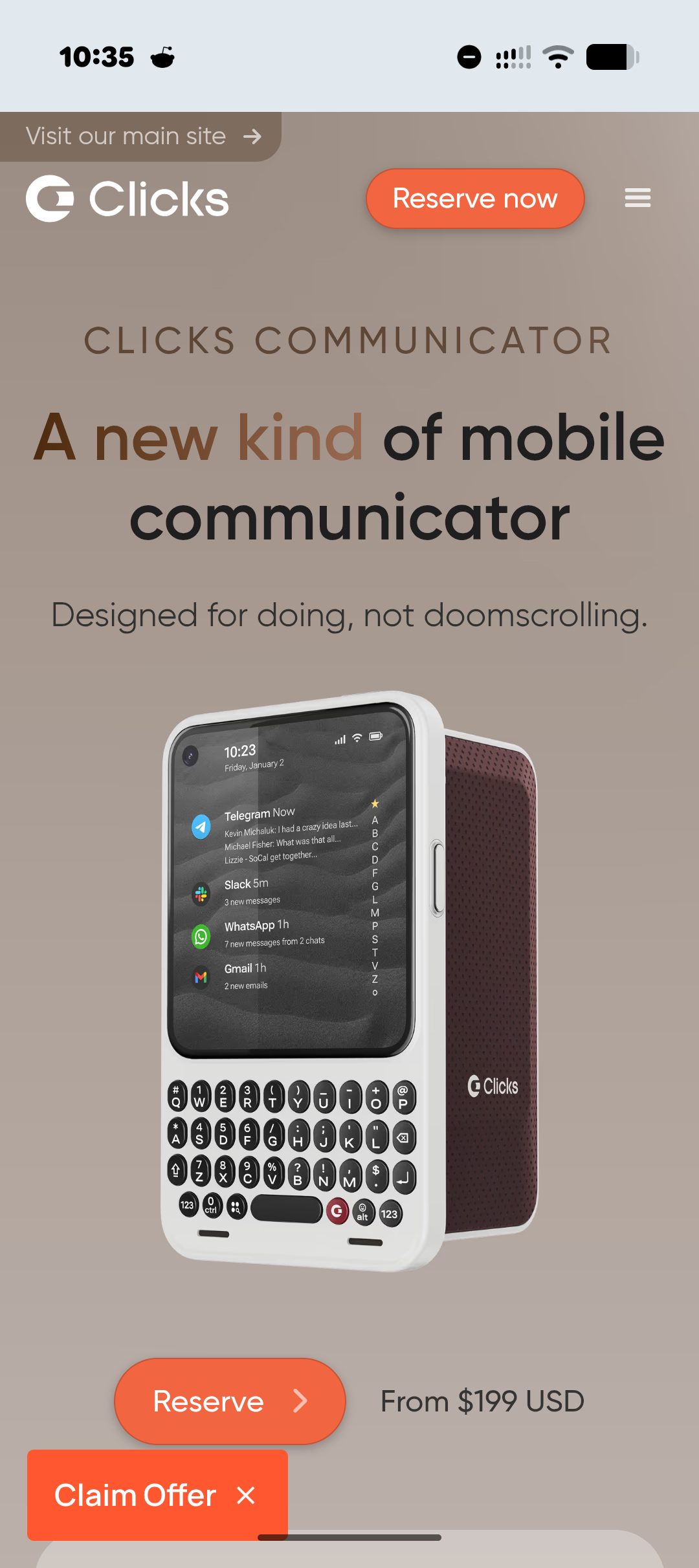 a website showing a new phone in white with a keyboard and keys to type on.